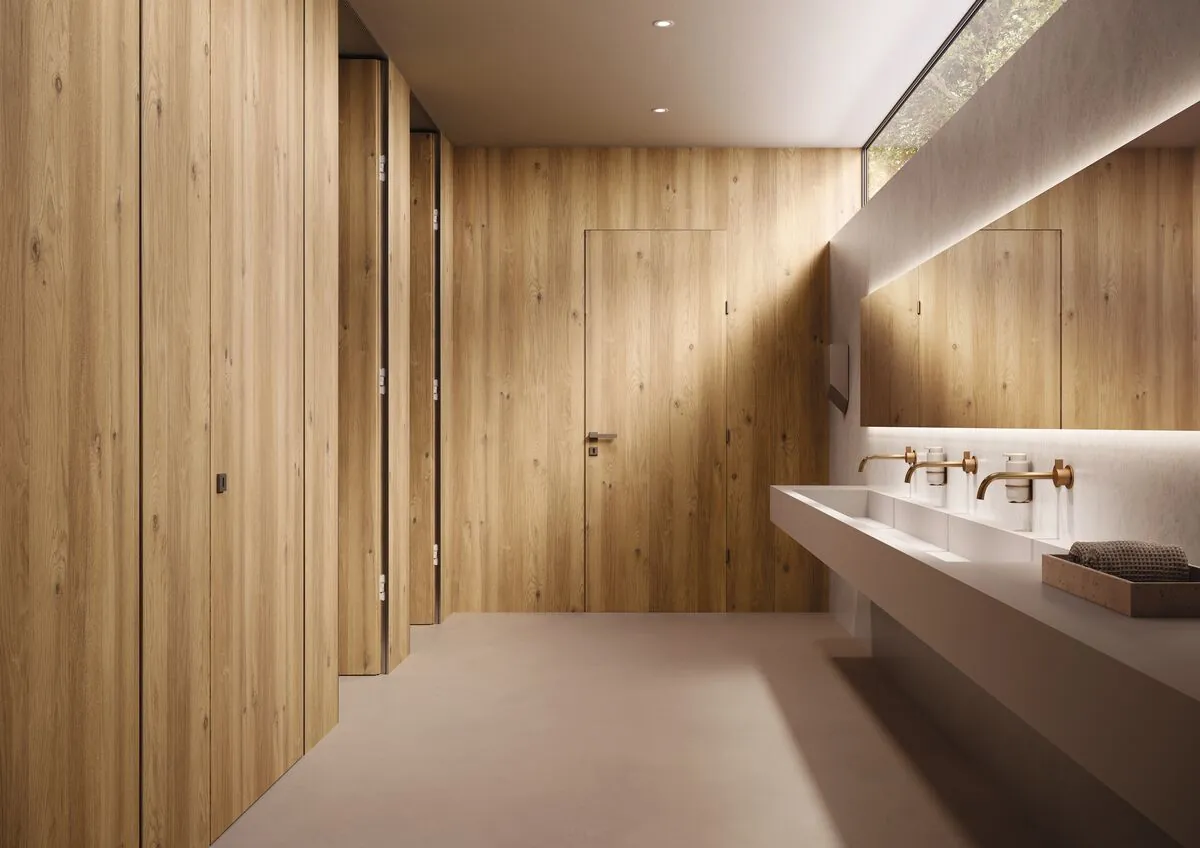 Cabines et revêtements muraux de sanitaires en stratifié aspect chêne